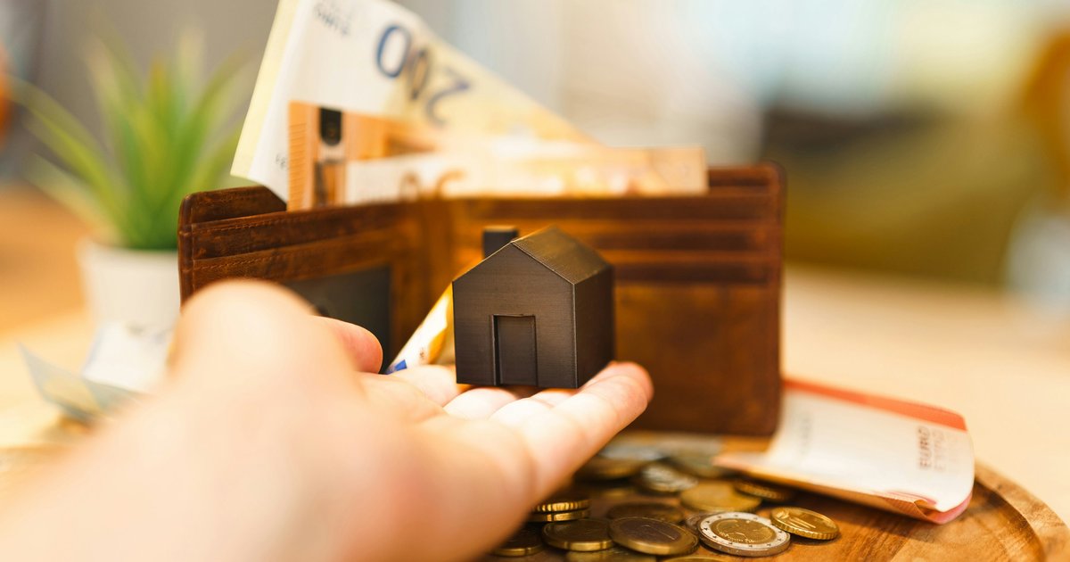 Dallas homeowner reviewing mortgage documents and equity options at a home office desk