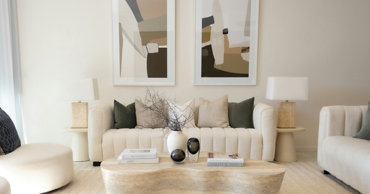 A clean, neutral living room staged for sale in the Dallas suburbs — light, uncluttered, and ready for buyer photography and in-person showings in the competitive 2026 DFW market.