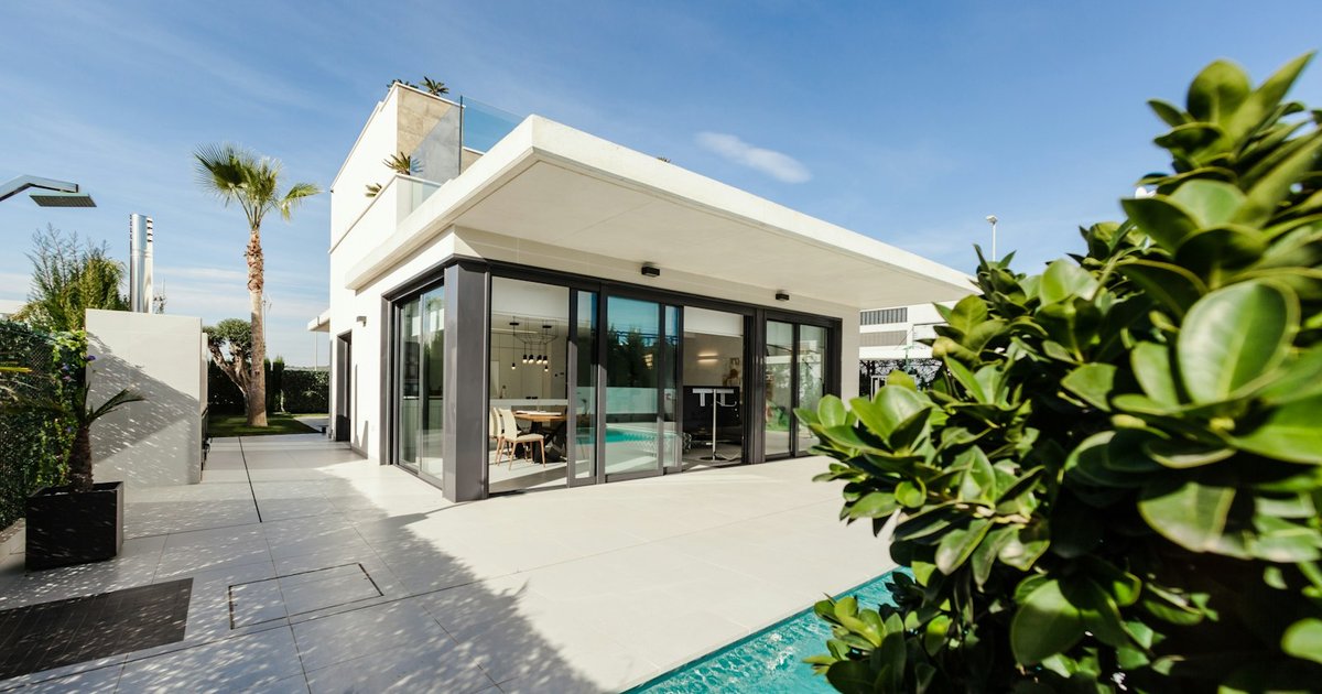 A modern Los Angeles home exterior on a quiet hillside street, representing the high-value properties where a liquidated damages clause can mean six-figure deposits are at stake