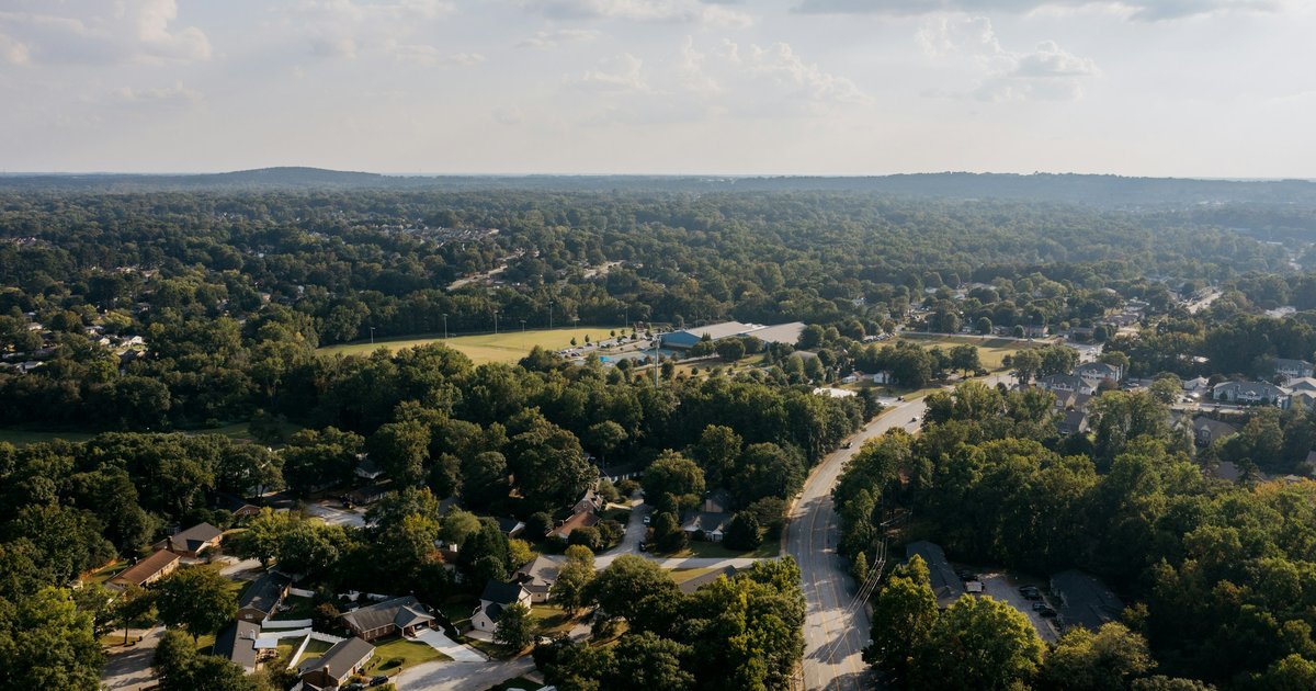 Aerial view of a tree-lined suburban neighborhood near Prosper, Texas