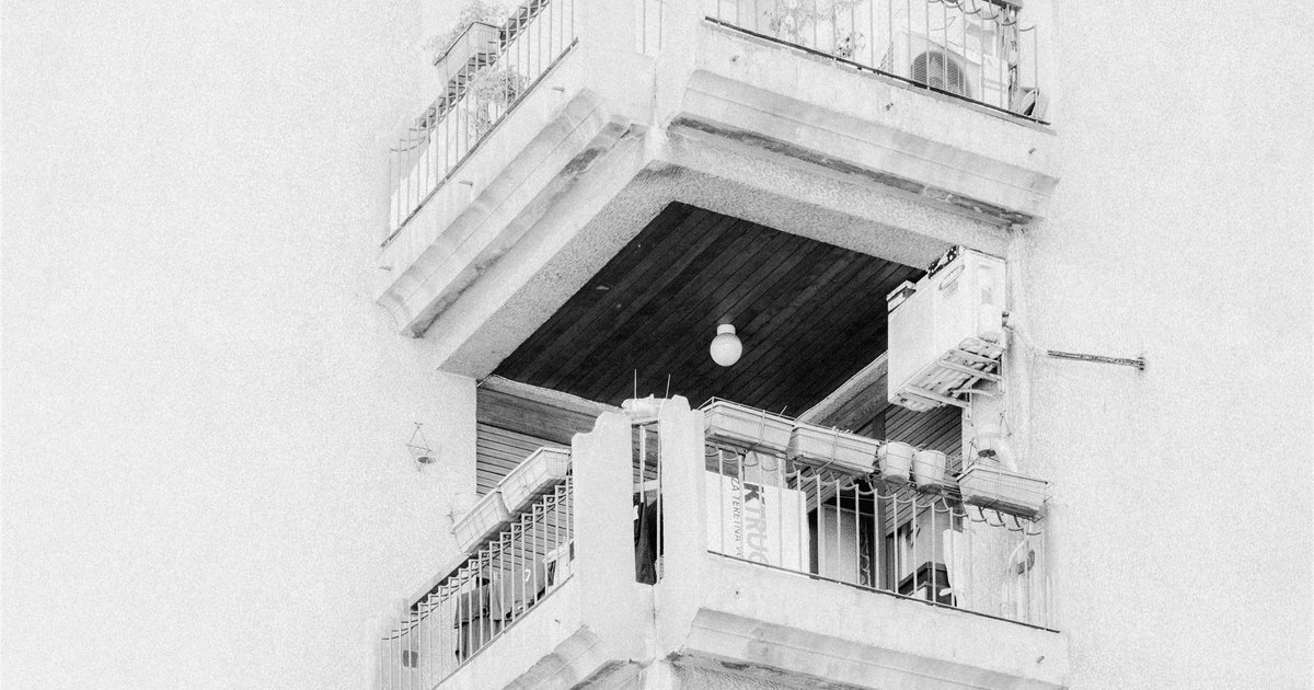 Exterior view of a Los Angeles condominium building showing balconies and elevated walkways that fall under California SB 326 inspection requirements for condo sellers.