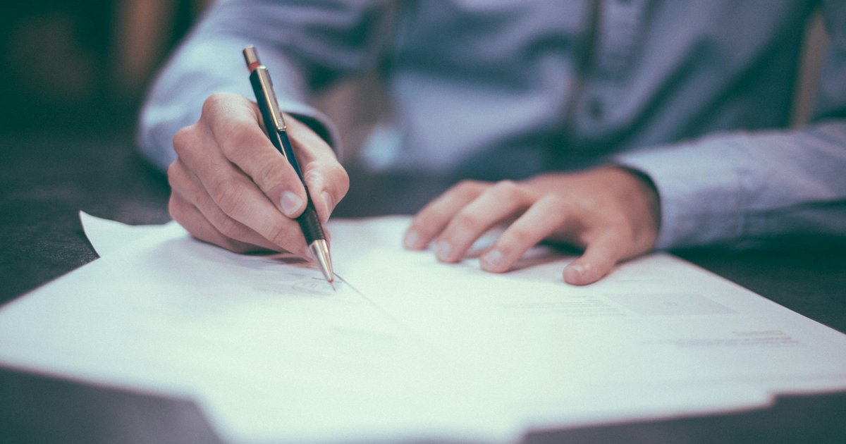 Escrow documents, house keys, and calculator on a desk representing the closing process for an LA home sale with a HELOC