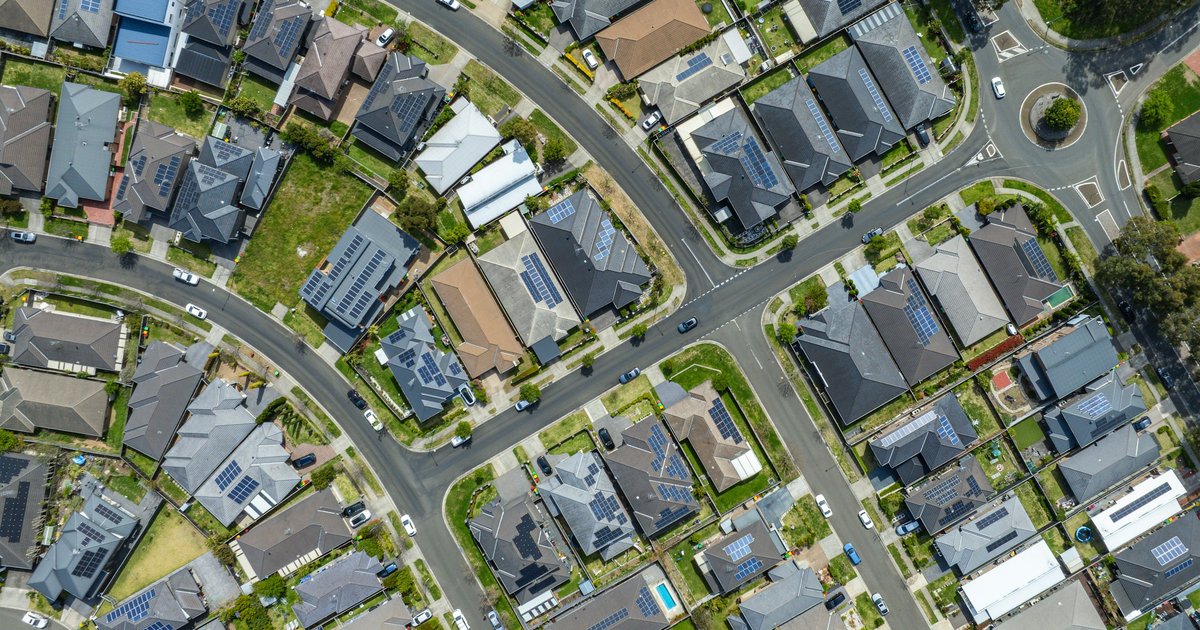 Aerial view of a new suburban subdivision with rows of houses and streets, representative of the master-planned communities being built on Sherman's edges