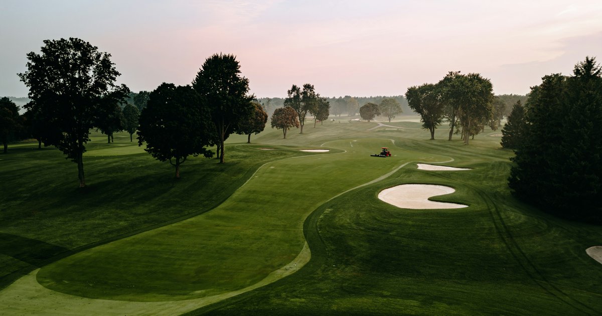 Morning light over a tree-lined golf course fairway, the kind of country-club setting that anchors Southlake's established neighborhoods