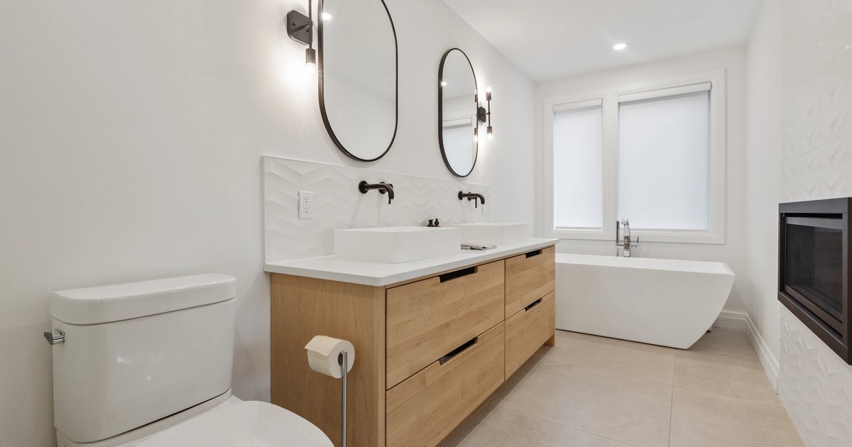 Low-flow showerhead and plumbing fixtures in a pre-1994 Los Angeles home
