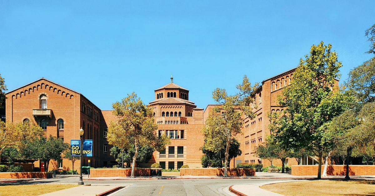 Large brick university building with mature trees near the UCLA campus in Westwood